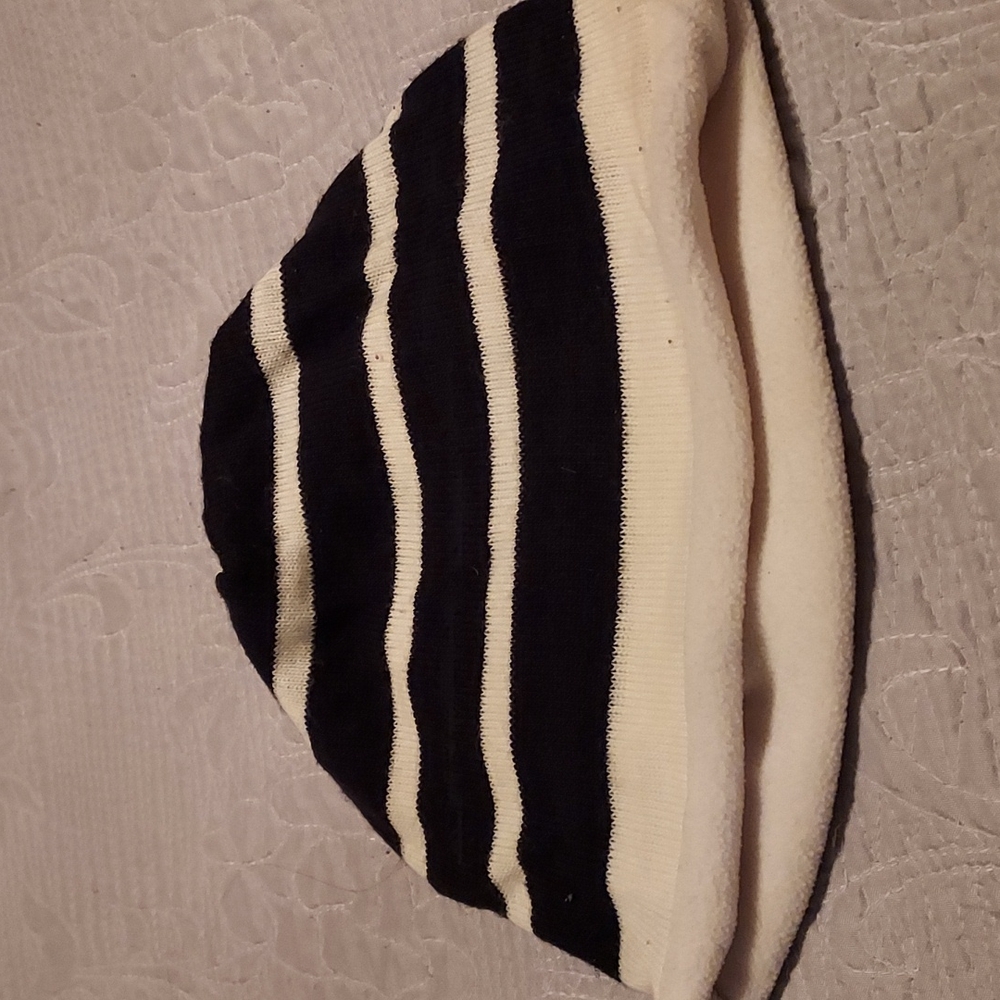 Blue and white beanie cap